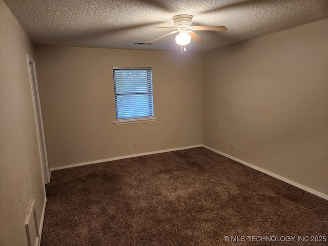 1669 S Pine Ave W, Broken Arrow, OK 74012 - unfurnished room featuring a textured ceiling, a ceiling fan, and dark colored carpet