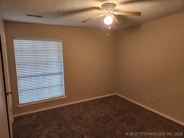 1669 S Pine Ave W, Broken Arrow, OK 74012 - carpeted empty room with a ceiling fan and a textured ceiling