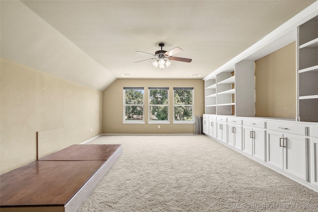 7816 E Galveston St, Broken Arrow, OK 74014 - additional living space featuring a ceiling fan, light colored carpet, and vaulted ceiling