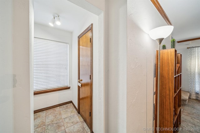 4704 W 88th St, Tulsa, OK 74132 - hallway featuring stone finish floors