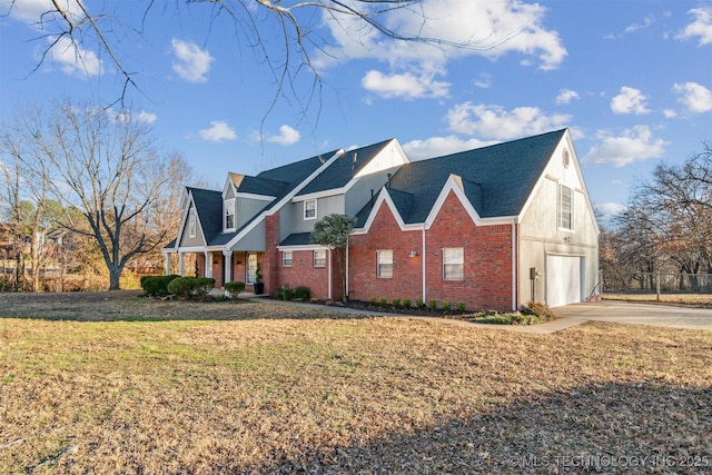 4704 W 88th St, Tulsa, OK 74132 - view of front facade with brick siding, driveway, a garage, and roof with shingles