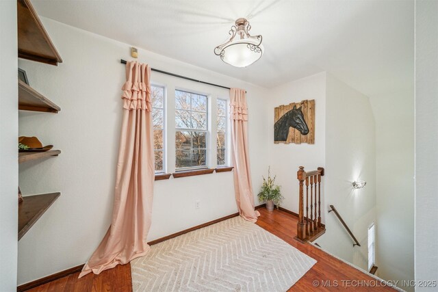 4704 W 88th St, Tulsa, OK 74132 - bedroom with wood finished floors and baseboards