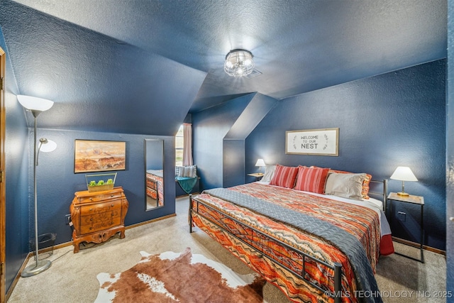 4704 W 88th St, Tulsa, OK 74132 - carpeted bedroom featuring a textured wall, a textured ceiling, and lofted ceiling