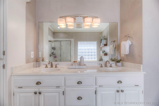 8414 E 99th Pl, Tulsa, OK 74133 - full bathroom with ornamental molding, double vanity, and a stall shower