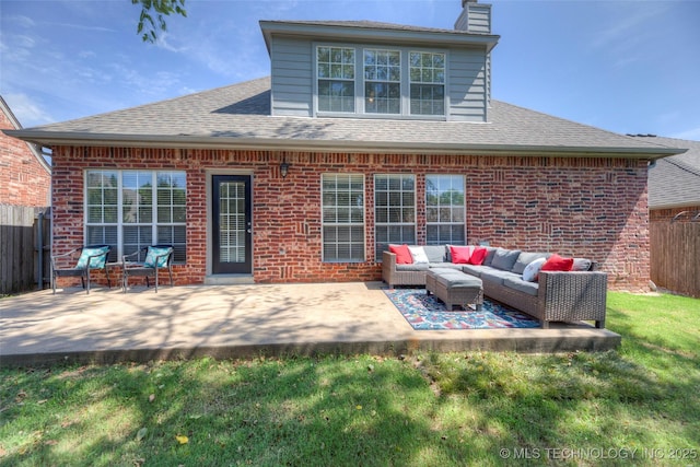 8414 E 99th Pl, Tulsa, OK 74133 - back of house with an outdoor hangout area, brick siding, a chimney, and a patio area