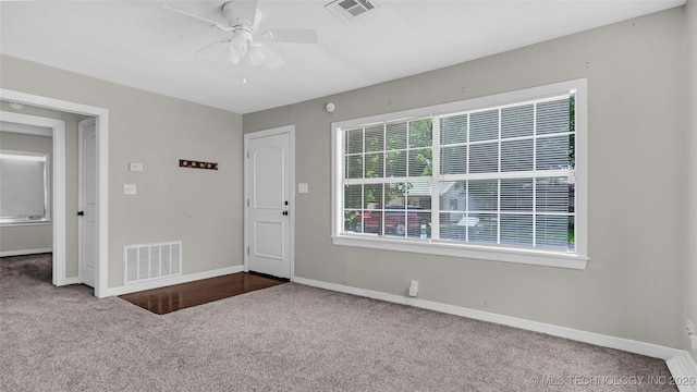 1412 Healdton Blvd, Ardmore, OK 73401 - foyer entrance with carpet flooring and a ceiling fan