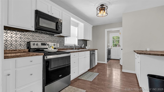 1412 Healdton Blvd, Ardmore, OK 73401 - kitchen featuring stainless steel appliances, tasteful backsplash, white cabinets, dark wood finished floors, and butcher block counters