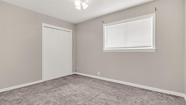 1412 Healdton Blvd, Ardmore, OK 73401 - unfurnished bedroom featuring carpet floors and a closet