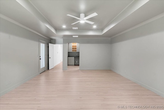 4155 S Birmingham Pl, Tulsa, OK 74105 - unfurnished room with a tray ceiling, light wood-style flooring, ceiling fan, crown molding, and recessed lighting