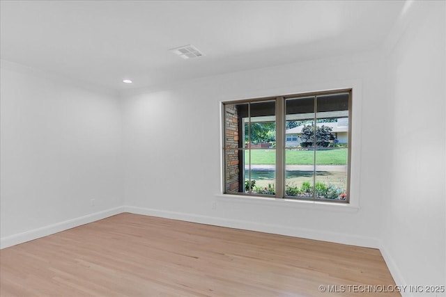 4155 S Birmingham Pl, Tulsa, OK 74105 - spare room featuring light wood-style flooring, recessed lighting, and ornamental molding
