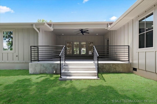 4155 S Birmingham Pl, Tulsa, OK 74105 - doorway to property featuring a ceiling fan, a lawn, board and batten siding, and french doors