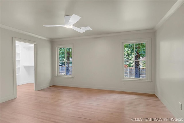 4155 S Birmingham Pl, Tulsa, OK 74105 - empty room with crown molding, light wood-style flooring, and a ceiling fan
