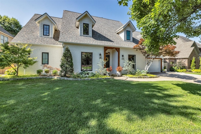 5414 E 109th Pl, Tulsa, OK 74137 - cape cod home featuring brick siding, concrete driveway, a front lawn, an attached garage, and a shingled roof
