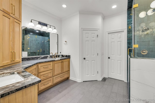5414 E 109th Pl, Tulsa, OK 74137 - bathroom featuring double vanity, a shower stall, crown molding, recessed lighting, and wood finished floors