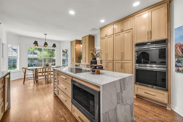 5414 E 109th Pl, Tulsa, OK 74137 - kitchen featuring black appliances, light brown cabinetry, recessed lighting, wood finished floors, and light stone countertops