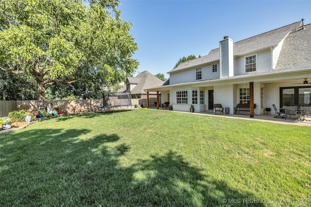 5414 E 109th Pl, Tulsa, OK 74137 - view of yard with a trampoline, a patio, and a ceiling fan