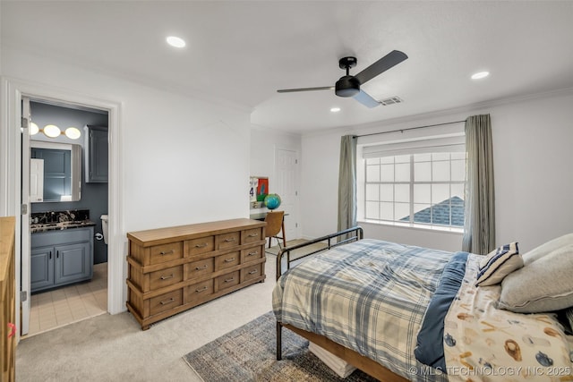 5414 E 109th Pl, Tulsa, OK 74137 - bedroom with crown molding, light colored carpet, recessed lighting, connected bathroom, and ceiling fan