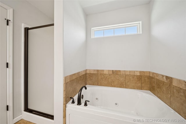 9246 N 143rd E Ave, Owasso, OK 74055 - bathroom featuring a shower stall and a jetted tub