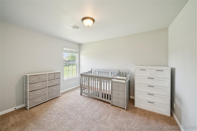 9246 N 143rd E Ave, Owasso, OK 74055 - bedroom featuring carpet flooring and a crib
