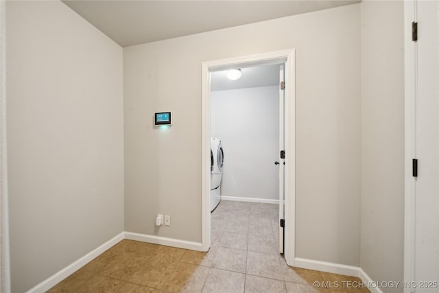 9246 N 143rd E Ave, Owasso, OK 74055 - washroom with light tile patterned floors and washer and clothes dryer