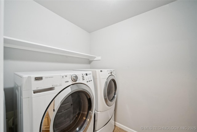 9246 N 143rd E Ave, Owasso, OK 74055 - washroom featuring washer and dryer and baseboards