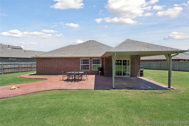 9246 N 143rd E Ave, Owasso, OK 74055 - back of property featuring brick siding, a fenced backyard, a shingled roof, and a patio