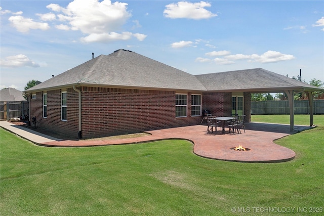 9246 N 143rd E Ave, Owasso, OK 74055 - back of house featuring a fire pit, brick siding, a patio, and a shingled roof