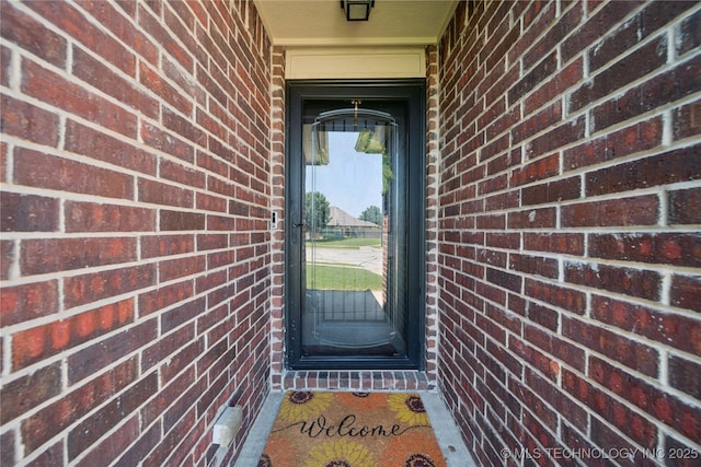 9246 N 143rd E Ave, Owasso, OK 74055 - view of exterior entry with brick siding