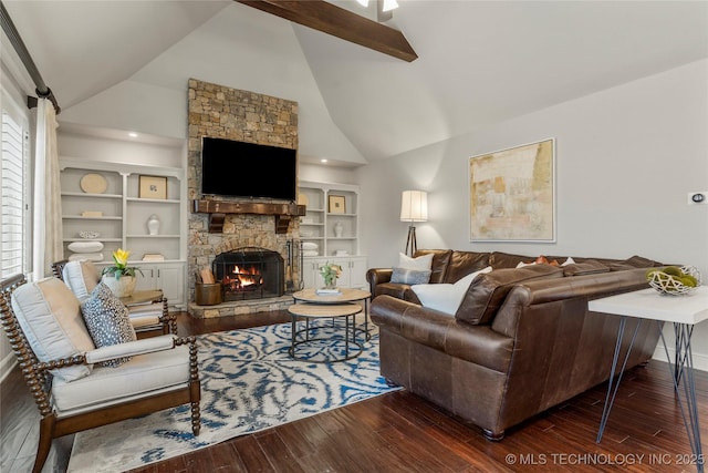 4620 E 108th Pl S, Tulsa, OK 74137 - living area with wood finished floors, a stone fireplace, high vaulted ceiling, and built in shelves