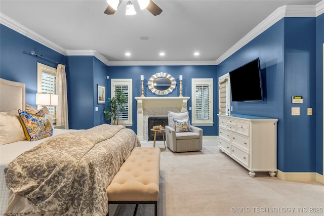 4620 E 108th Pl S, Tulsa, OK 74137 - bedroom featuring light carpet, recessed lighting, a lit fireplace, ornamental molding, and ceiling fan