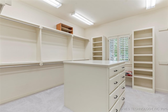 4620 E 108th Pl S, Tulsa, OK 74137 - walk in closet with light colored carpet