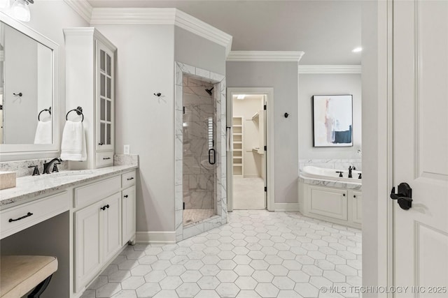 4620 E 108th Pl S, Tulsa, OK 74137 - full bath featuring a stall shower, a garden tub, vanity, a spacious closet, and ornamental molding