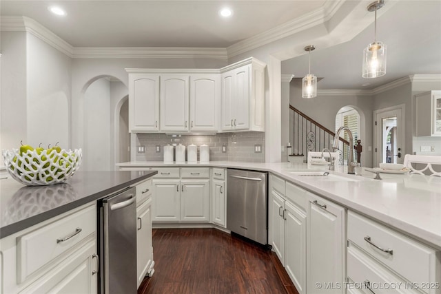 4620 E 108th Pl S, Tulsa, OK 74137 - kitchen with dishwasher, arched walkways, recessed lighting, dark wood finished floors, and white cabinets