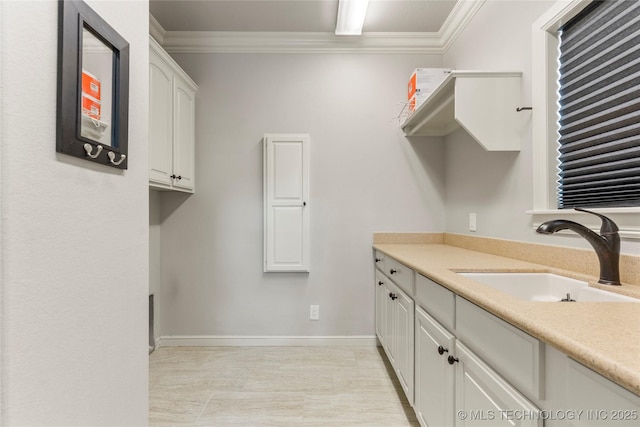 4620 E 108th Pl S, Tulsa, OK 74137 - laundry room with a sink and ornamental molding