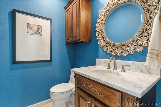 4620 E 108th Pl S, Tulsa, OK 74137 - bathroom featuring vanity and a textured wall