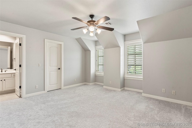 4620 E 108th Pl S, Tulsa, OK 74137 - bonus room featuring ceiling fan, light carpet, and lofted ceiling