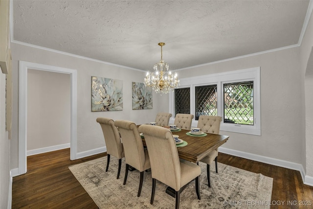 1743 S Florence Pl, Tulsa, OK 74104 - dining room with dark wood-style floors, ornamental molding, a chandelier, and a textured ceiling