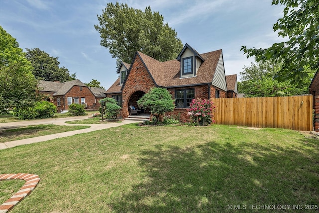 1743 S Florence Pl, Tulsa, OK 74104 - tudor-style house featuring brick siding
