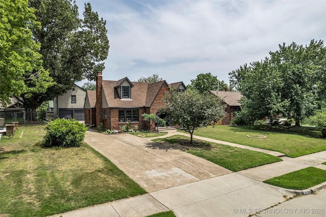 1743 S Florence Pl, Tulsa, OK 74104 - view of front of house with brick siding, a chimney, and driveway