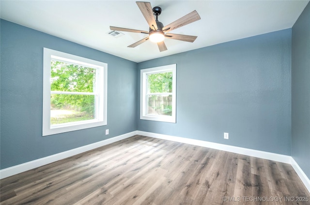 2532 E 4th St, Tulsa, OK 74104 - unfurnished room with wood finished floors and a ceiling fan