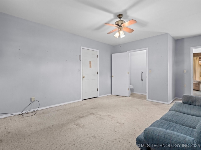 320 E 7th St, Pawhuska, OK 74056 - sitting room with a ceiling fan and carpet