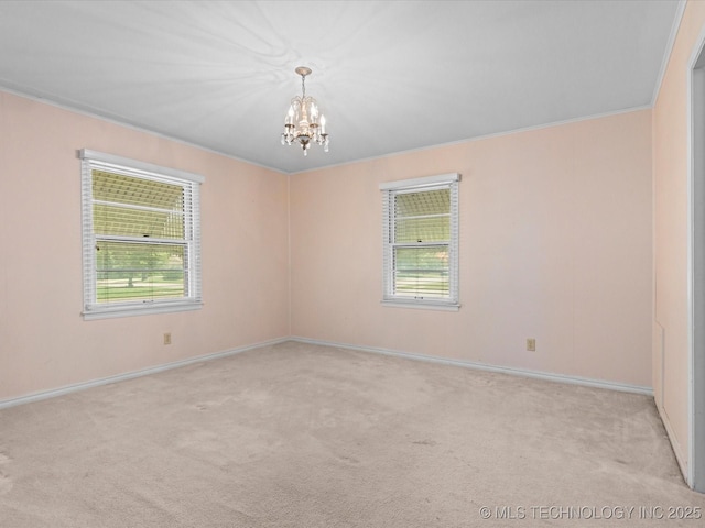320 E 7th St, Pawhuska, OK 74056 - unfurnished room featuring a chandelier, light carpet, and crown molding