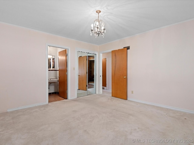 320 E 7th St, Pawhuska, OK 74056 - unfurnished bedroom featuring a chandelier, ornamental molding, and carpet
