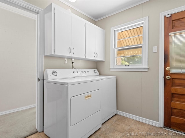 320 E 7th St, Pawhuska, OK 74056 - laundry room with independent washer and dryer, cabinet space, and crown molding