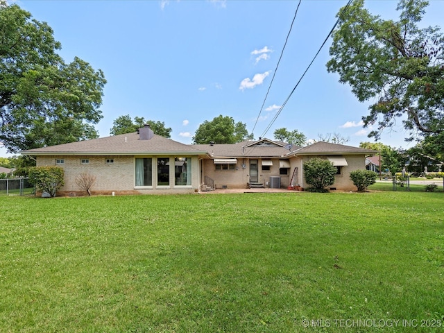 320 E 7th St, Pawhuska, OK 74056 - back of property with brick siding, a patio, and a chimney