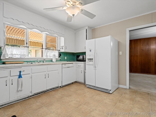 320 E 7th St, Pawhuska, OK 74056 - kitchen featuring white appliances, light countertops, a ceiling fan, white cabinetry, and backsplash