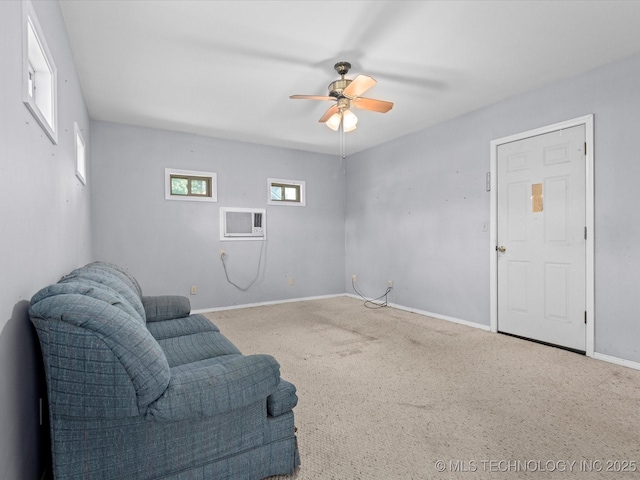 320 E 7th St, Pawhuska, OK 74056 - unfurnished room featuring a ceiling fan, an AC wall unit, and carpet flooring