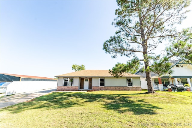 410 Denver St, Pawnee, OK 74058 - single story home with brick siding, a front yard, a porch, and a shingled roof
