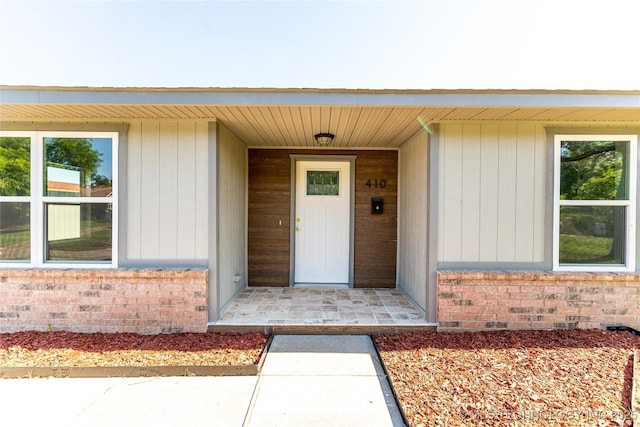 410 Denver St, Pawnee, OK 74058 - doorway to property with brick siding and crawl space