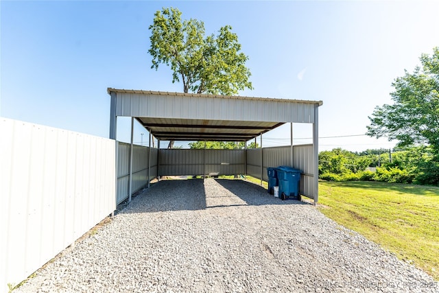 410 Denver St, Pawnee, OK 74058 - view of parking with gravel driveway and a detached carport
